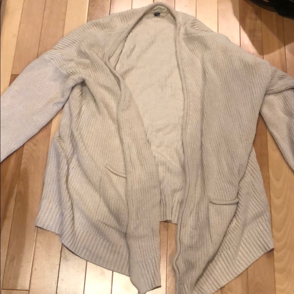 Knitted long cardigan. Covers the bum!